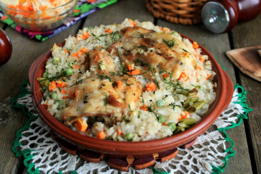 Rice with vegetables and chicken in the oven