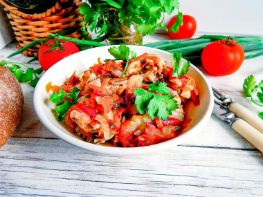 Chicken fillet with vegetables in a frying pan