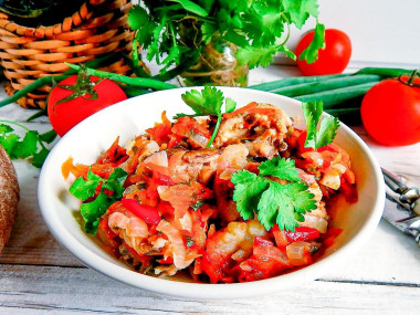 Chicken fillet with vegetables in a frying pan