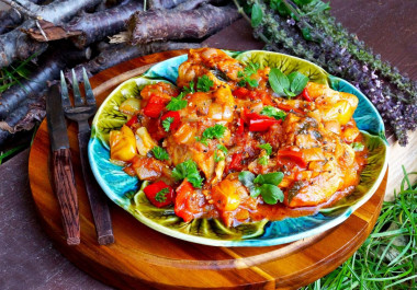 Georgian Chakhokhbili chicken in a cauldron over a campfire