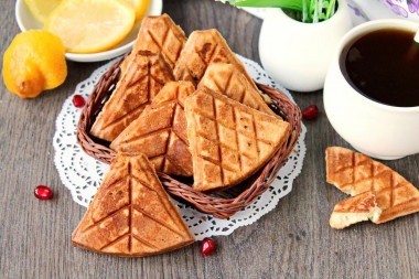 Waffle cookies in a waffle iron