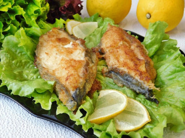 Catfish steak in a frying pan