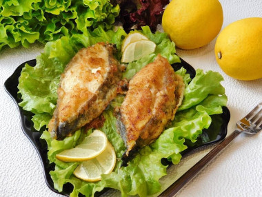 Catfish steak in a frying pan