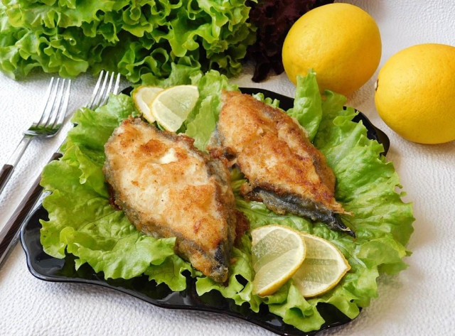 Catfish steak in a frying pan