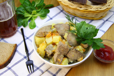 Liver with potatoes in a frying pan