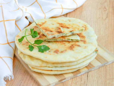 Tortillas with cottage cheese in a pan on kefir