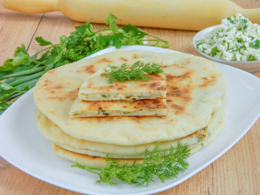 Tortillas with cottage cheese in a pan on kefir