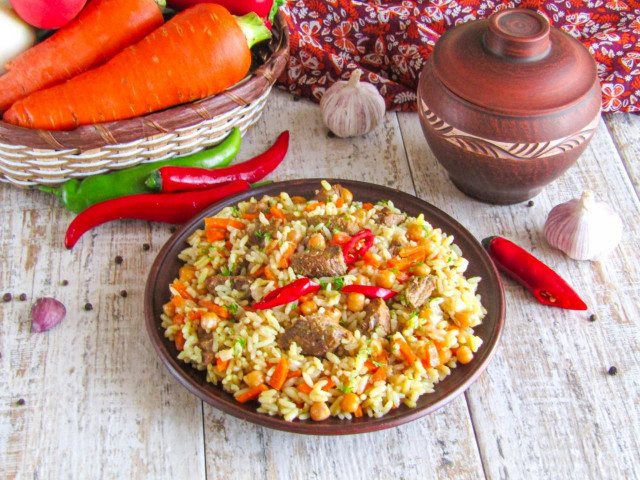 Tajik pilaf in a cauldron