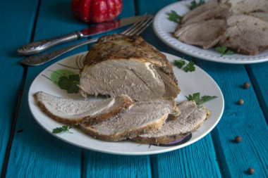 Pork ham in foil in the oven