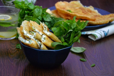 Chebureks with cottage cheese and herbs