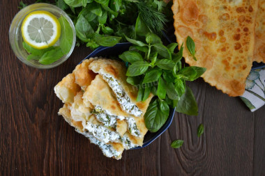 Chebureks with cottage cheese and herbs