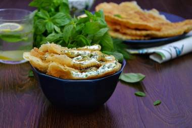 Chebureks with cottage cheese and herbs