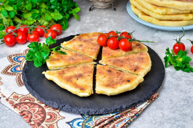 Khachapuri on kefir with cottage cheese in a frying pan