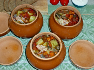 Soup in pots in the oven