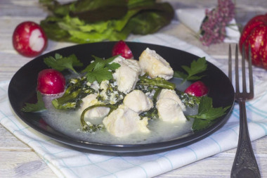 Chicken fillet with broccoli in cream sauce