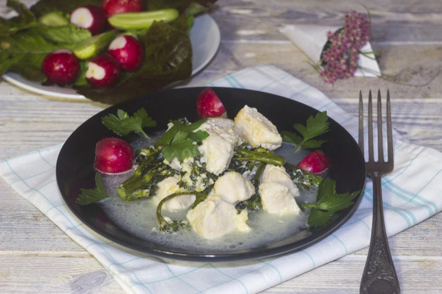 Chicken fillet with broccoli in cream sauce