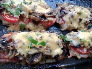 Pork with mushrooms in the oven