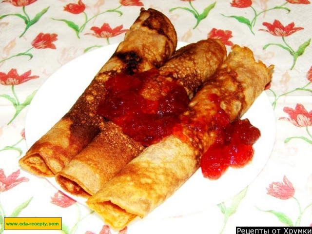 Sweet pancakes with strawberries and cottage cheese