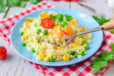 Rice with vegetables on the side