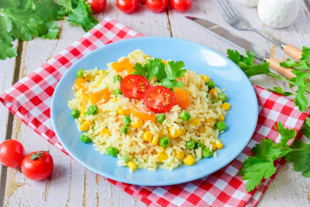 Rice with vegetables on the side