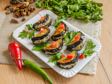 Appetizer eggplant with garlic slices in Georgian