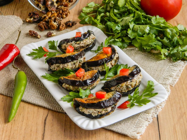 Appetizer eggplant with garlic slices in Georgian