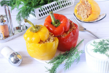 Peppers stuffed with meat and rice in a slow cooker