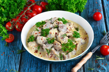 Pork in sour cream sauce in a slow cooker