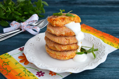 Cheesecakes with carrots and cottage cheese in a frying pan