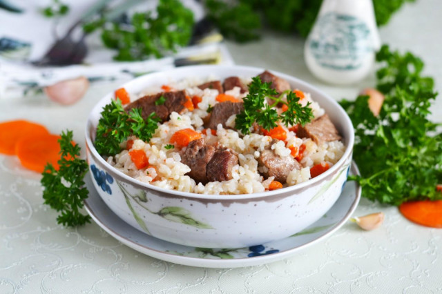 Beef pilaf in a frying pan