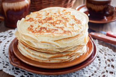 Pancakes on kefir are thick with holes