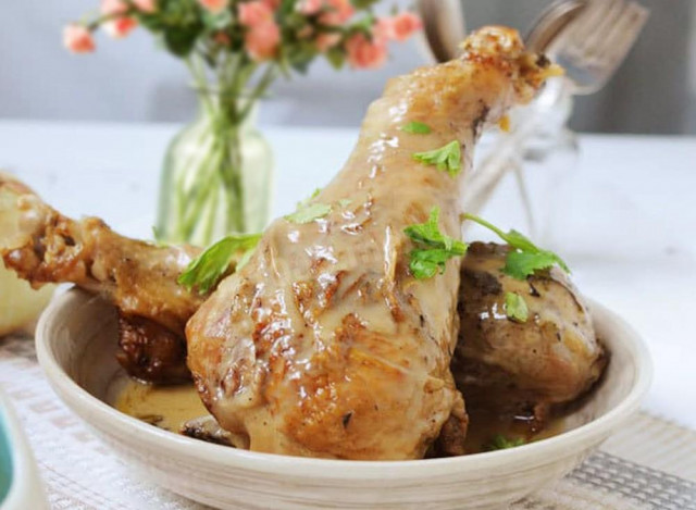 Turkey drumstick in a frying pan