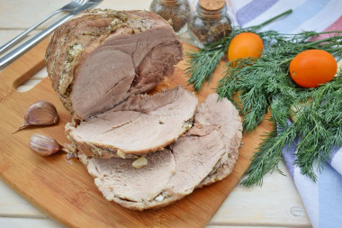 Pork baked in foil in a slow cooker