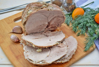 Pork baked in foil in a slow cooker