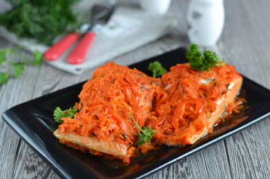 Stewed fish in the oven with vegetables