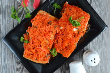 Stewed fish in the oven with vegetables