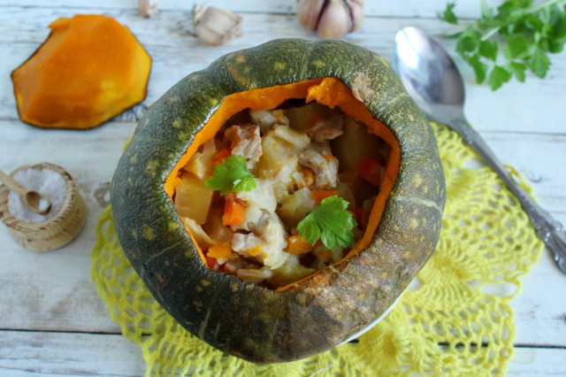 Meat with potatoes in pumpkin in the oven