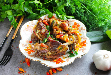 Meat in a cauldron in the oven