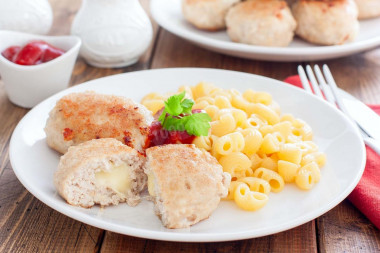 Minced meat cutlets with cheese filling inside