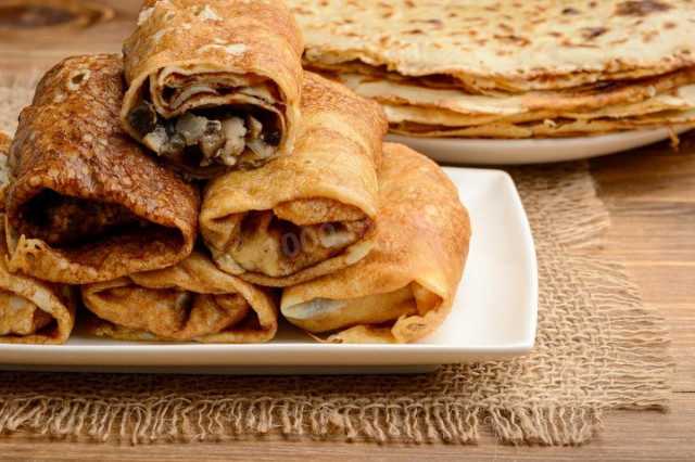 Pancakes stuffed with mushrooms