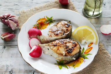 Salmon steak in a frying pan