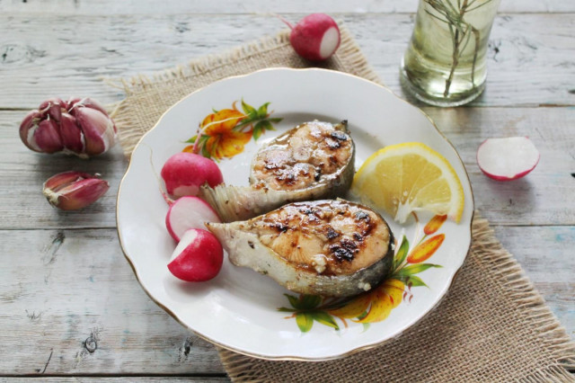 Salmon steak in a frying pan