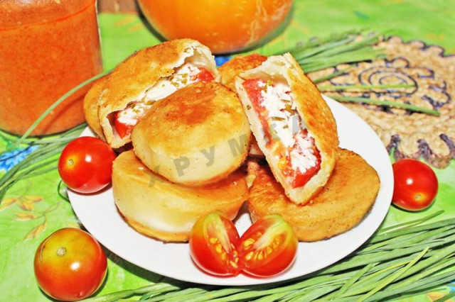 Pies bombs with tomatoes and cheese