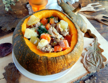 Pumpkin stuffed with meat baked in the oven