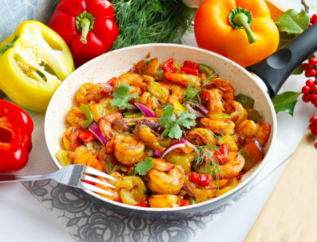 Shrimp with vegetables with soy sauce in a frying pan