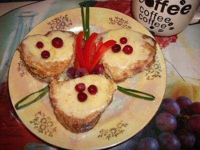 Egg croutons sprinkled with grated cheese