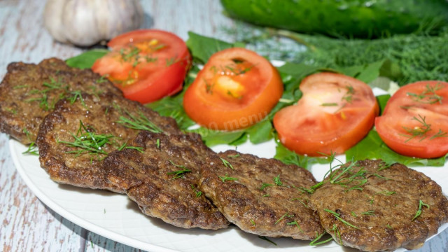 Beef liver pancakes with onion and rice with sour cream