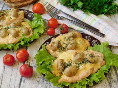 Canned champignons with chicken fillet and hard cheese