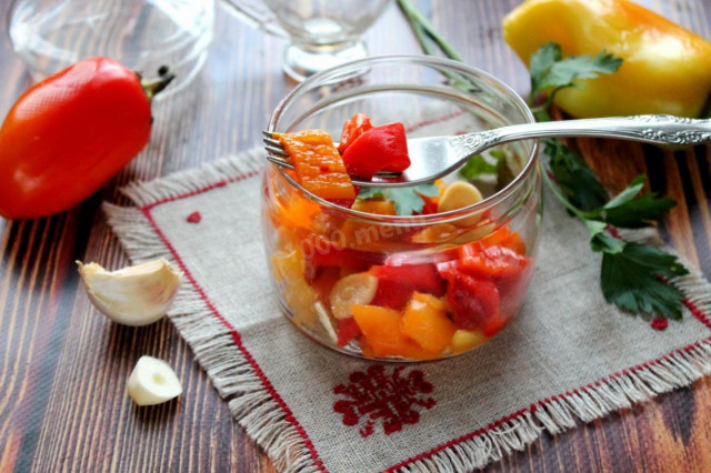 Baked peppers marinated with garlic for a snack