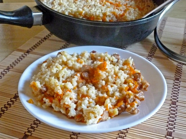 Pork pilaf in a deep frying pan